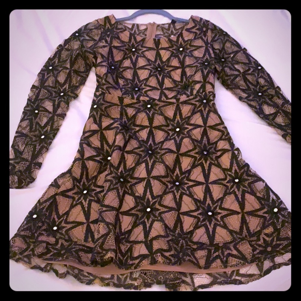 For love and lemons black- glass dress.